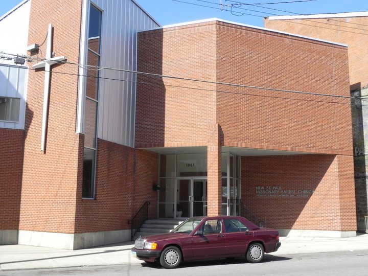 New St. Paul Church building entrance with car out front