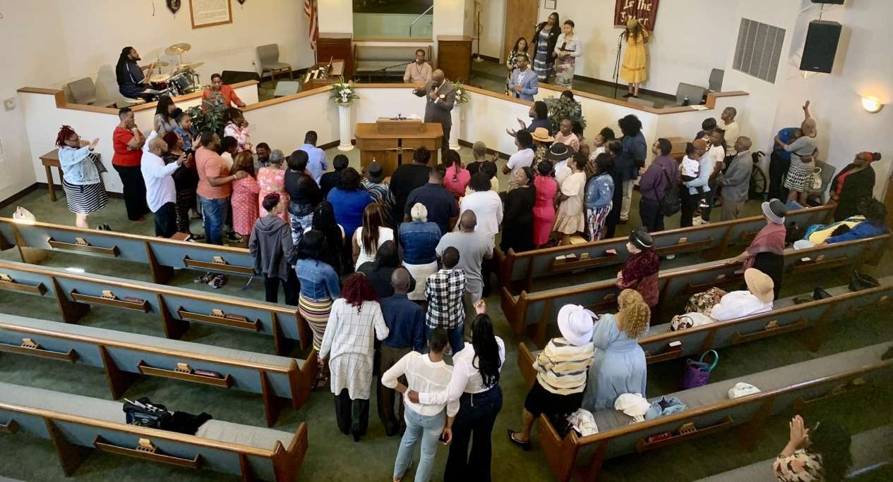 people gathering in church