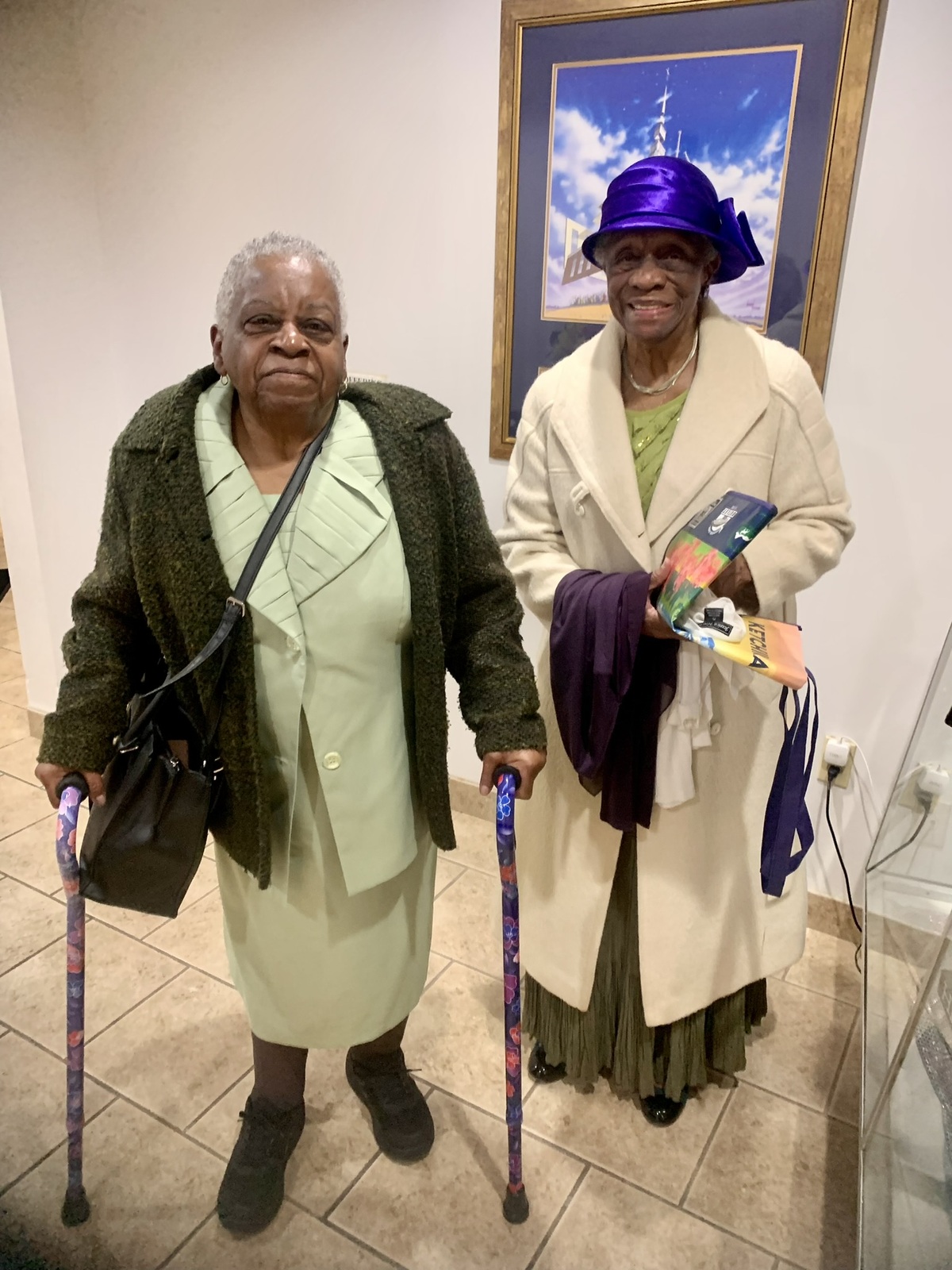 two women posing for photo